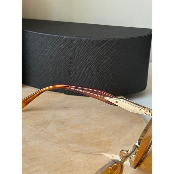 NEW Prada PR65ZS Oval Sunglasses in Gold Orange Tint - Picture 4 of 5